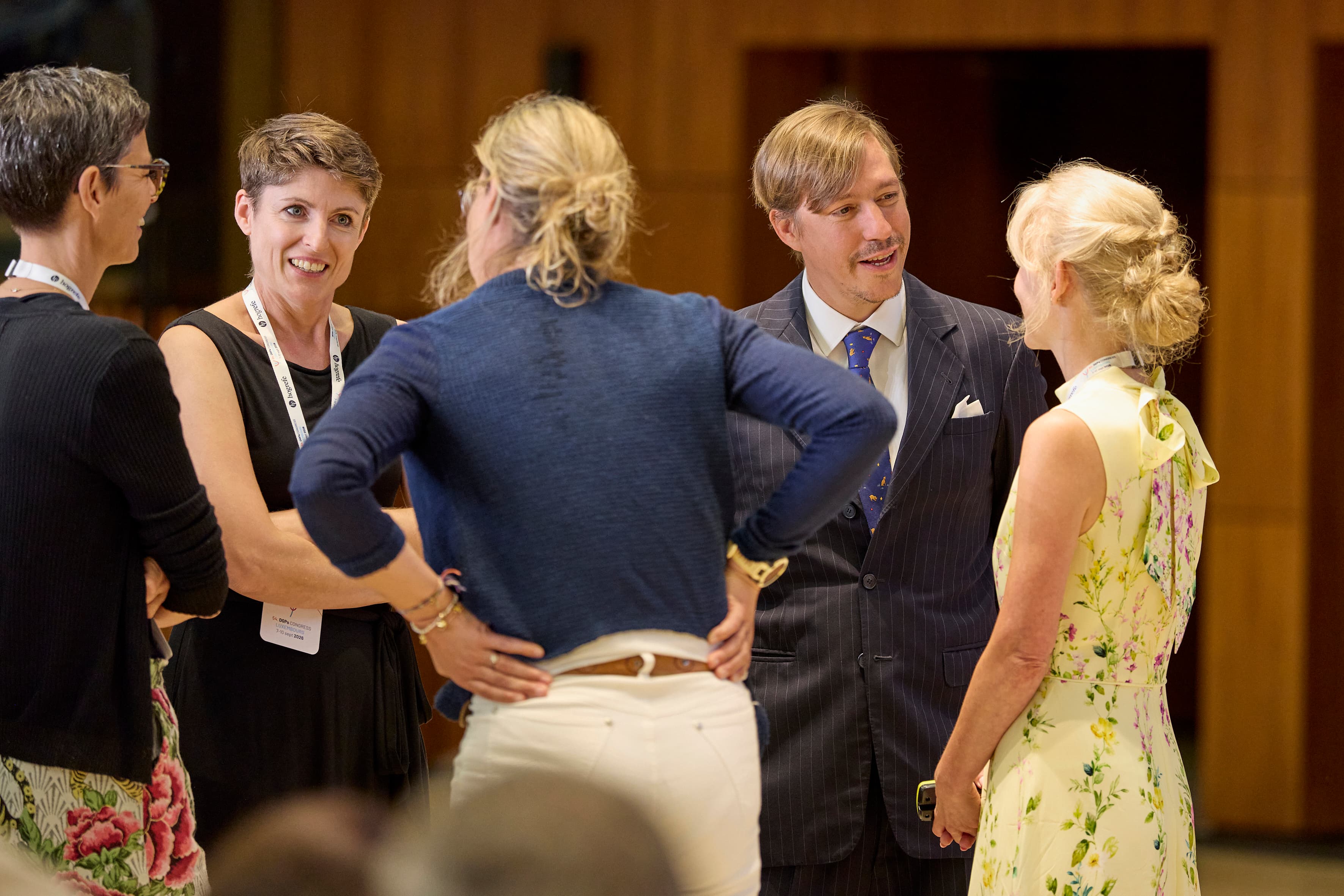 Participants and guests in conversation during the opening ceremony of the 54th DGPs Congress in Luxembourg.