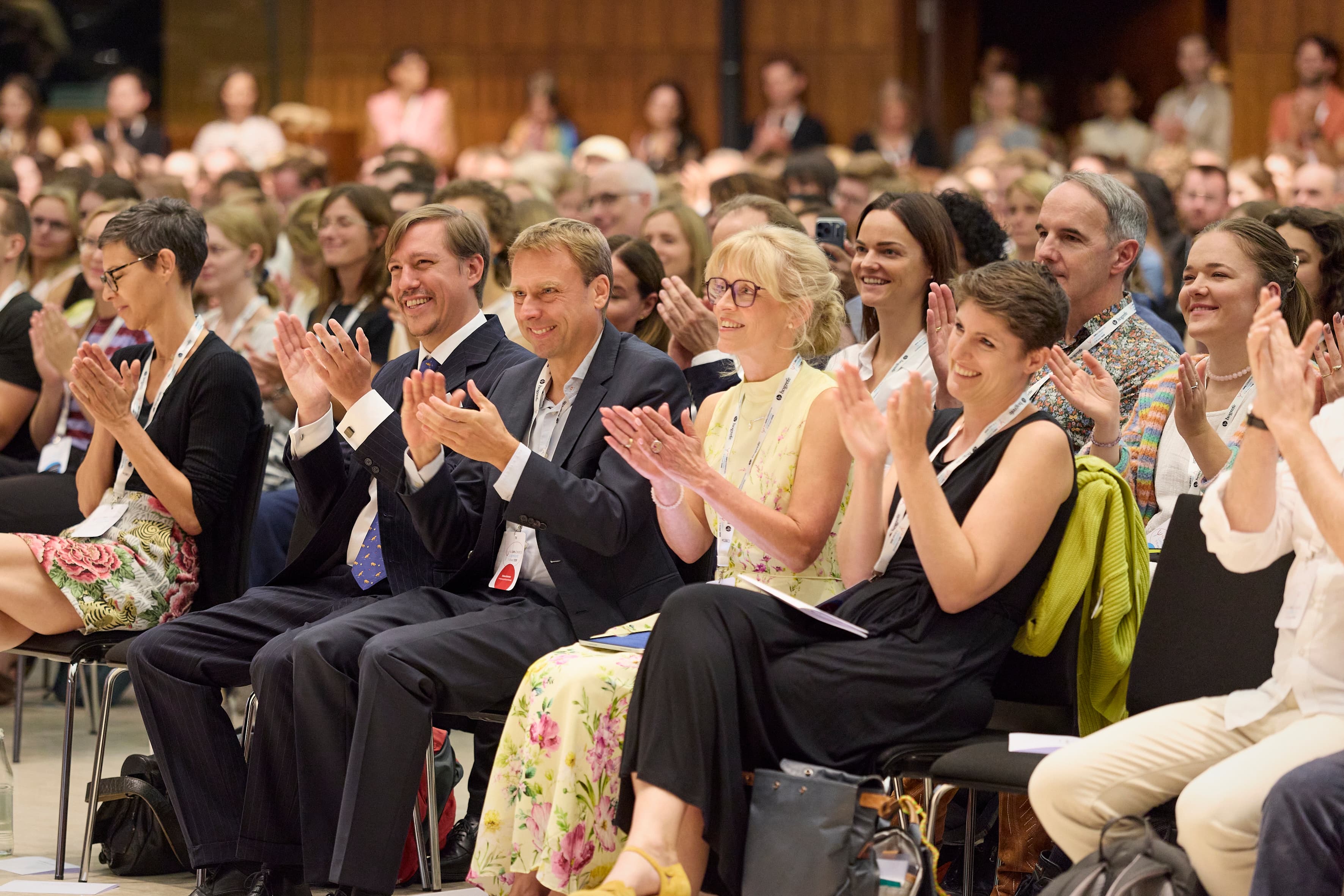Congress participants applaud during the opening ceremony of the 54th DGPs Congress in Luxembourg.