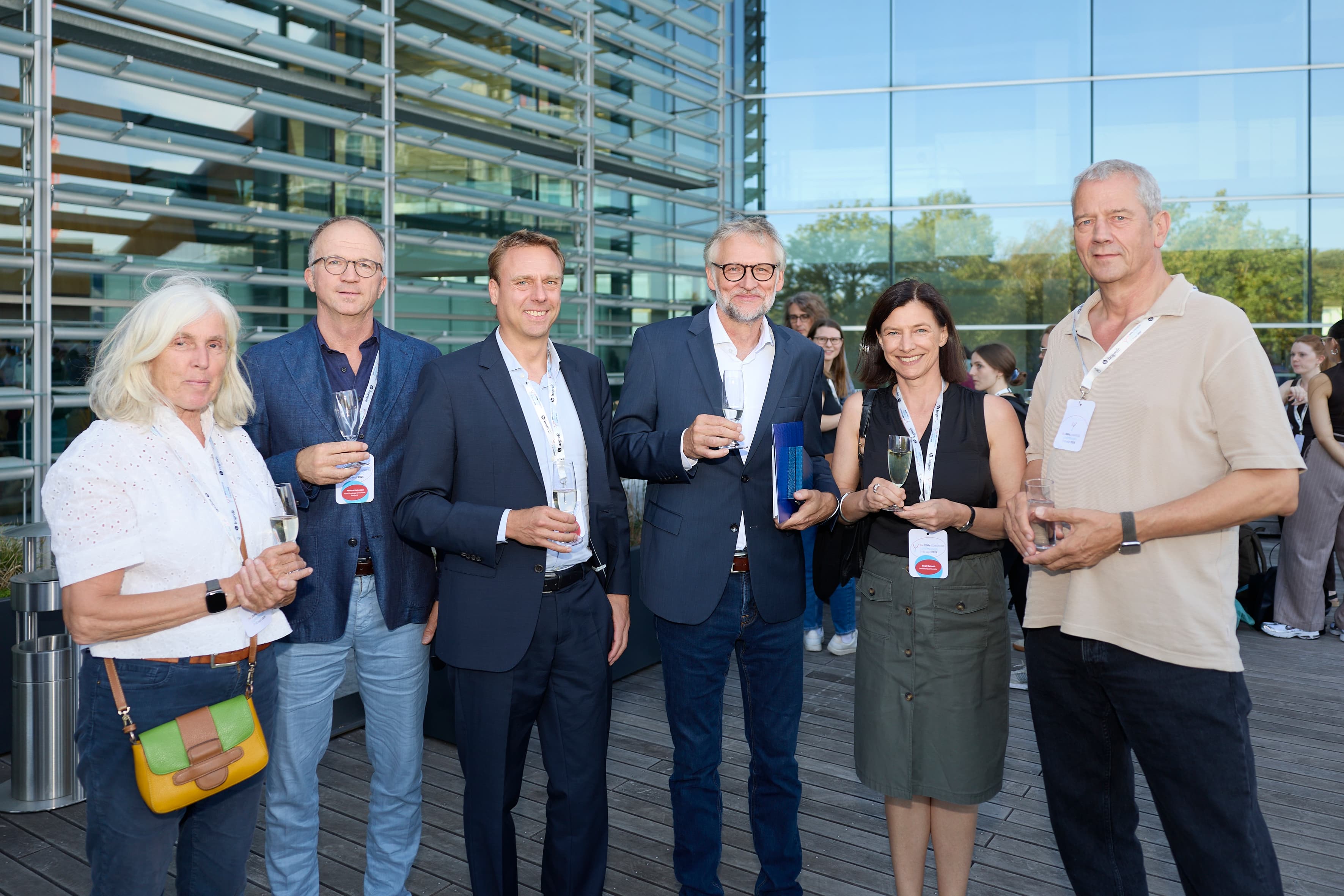 Guests gather for drinks and networking during a reception at the 54th DGPs Congress in Luxembourg.
